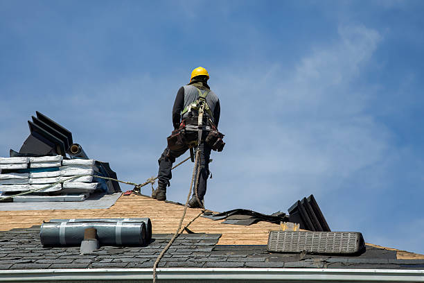 Professional Roofing technician working in Fife Lake, MI